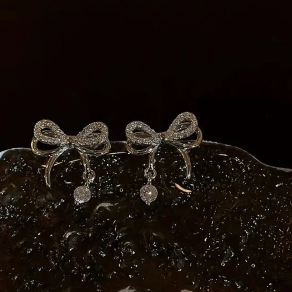 Mini Silver Bow Stud Earrings